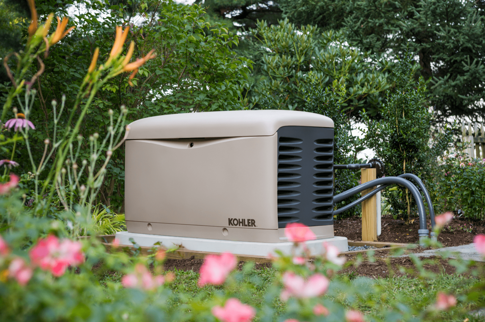 kohler-generator-min Premier Generator expert providing on-site consultation for a homeowner in Massachusetts